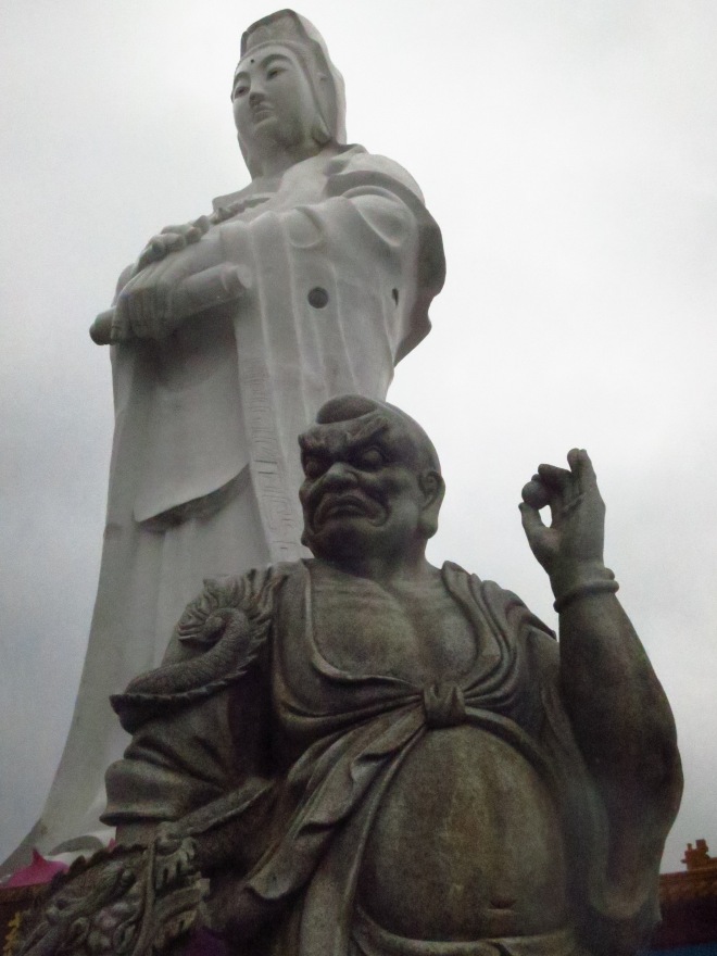 The huge white statue of Guanyin, looking out over Keelung Harbor